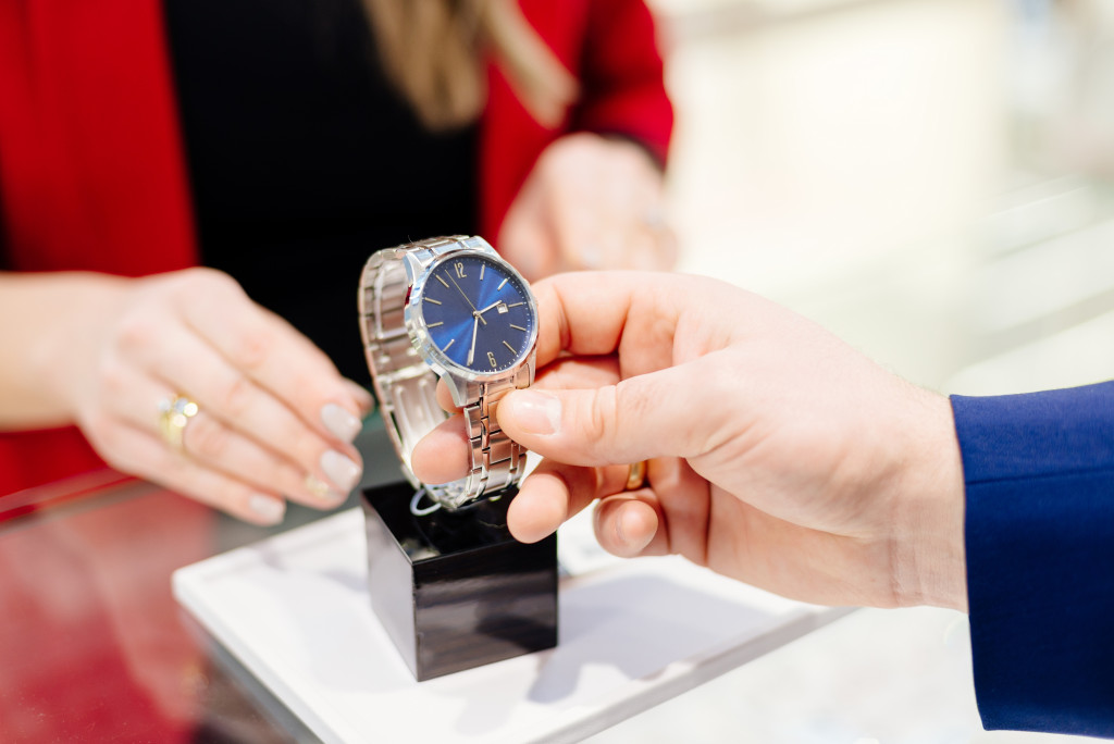 man buying a watch