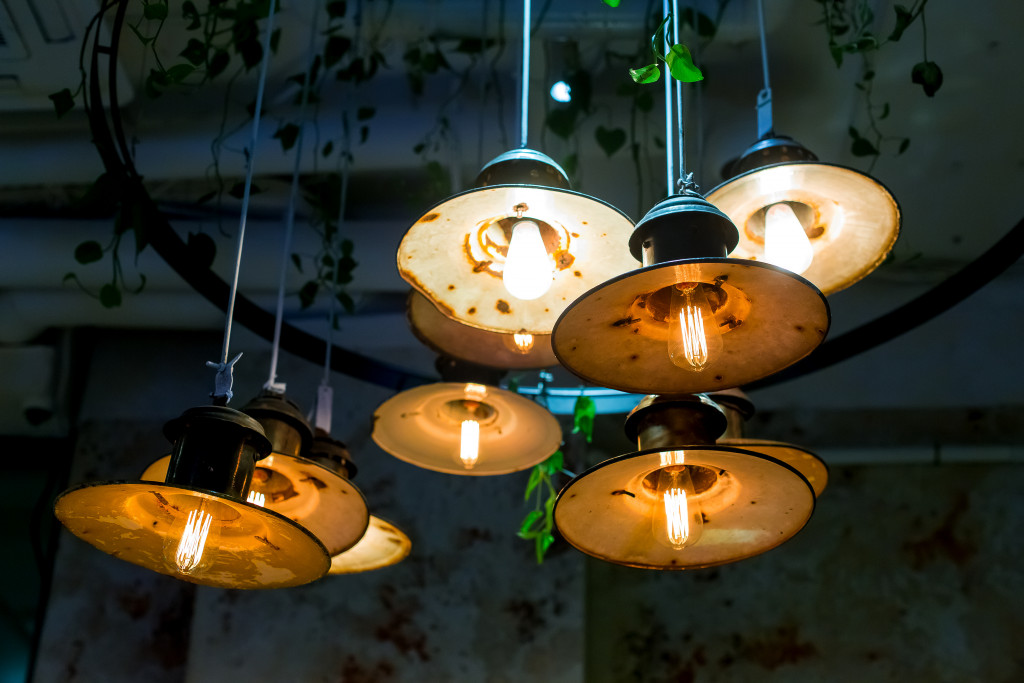 Retro lamps with vines hanging from the ceiling