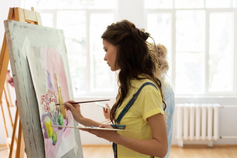 a female painter in in action